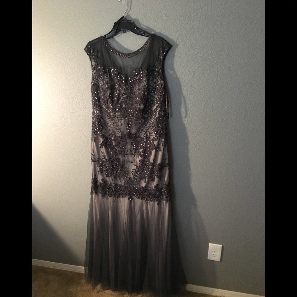 Beautiful sequence dress with floral detail.